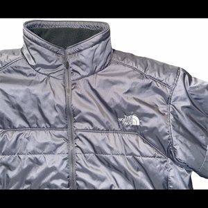 The North Face zip up puffer jacket.